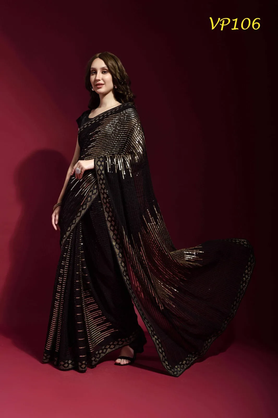 BRONZE SEQUENCE WORK ON BLACK SAREE - RENT